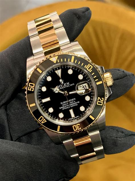 Rolex Submariner gold steel price